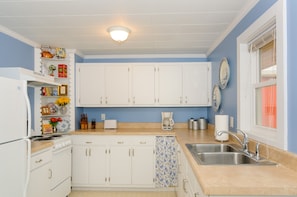 KITCHEN - Includes dishwasher, garbage disposal, stove, oven, microwave, fridge.