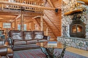A separate entertainment area is above in the loft