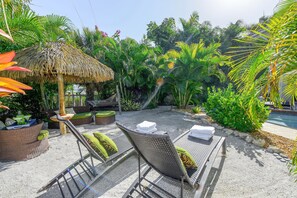 The Sunny Backyard Beach, Tiki Hut and Hammock are waiting for you!