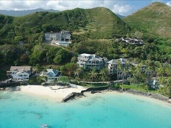 Secluded beach at the end of Lanikai, home is 3rd from the left above the beach.