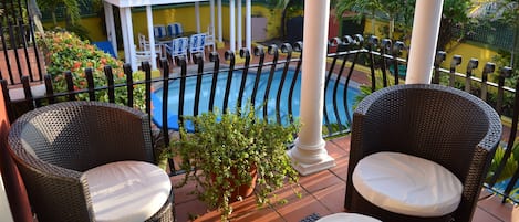 Pool and cabana view from one of 3 balconies with seating