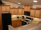 Well supplied with pots/pans in the full amenity kitchen lit by solar tubes