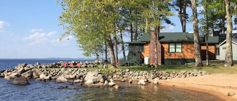 Side view of the camp showing part of the sandy beach