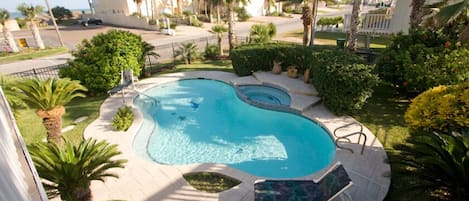 Pool/Jacuzzi Inviting for relaxation just across the street from the beach!!