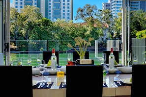 Beautiful water views from dining table, also over looking pool spa and garden.