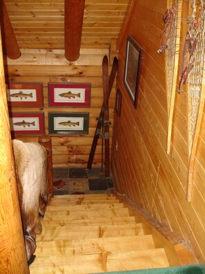 Staircase up to master bedroom suite with bath and loft to read!