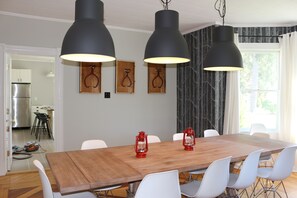 oversized dining room and table w/ custom intricately laid 200 year old hardwood