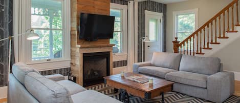 living room with fireplace and gorgeous custom details