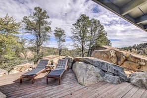 Steps from the master bedroom a private patio