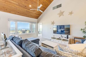 Top-Level Living Room with Deck Access