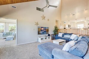 Top-Level Living Room with Deck Access