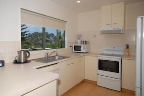 sizable kitchen including dishwasher