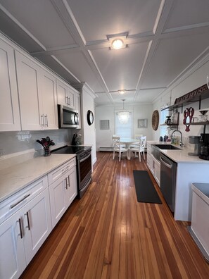 Beach House Kitchen featuring basic spices, sugar & tea packets, and coffee.