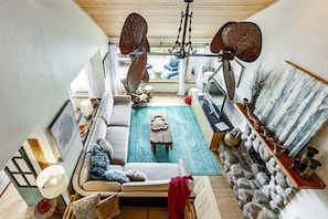 Main living area with fireplace - panoramic mountain views