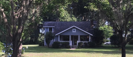 View of our home as you drive straight up the 300 yard driveway.