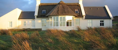 The cottage facing the sea.