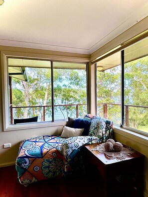 Unwind & relax on the comphy day bed - main living area upstairs 