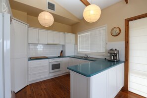 Fully equipped kitchen including espresso coffee machine