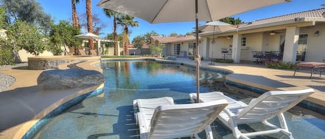 Pool with tanning ledge