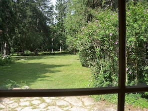 The beautiful view from the dining room into the back yard