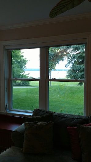 View from Living Room of bicycle trail and water in bay.