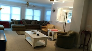 Living Room with double sleeper sofa, pass-through window