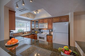 Kitchen is completely stocked so guests can prep and serve their favorite beverages and meals.