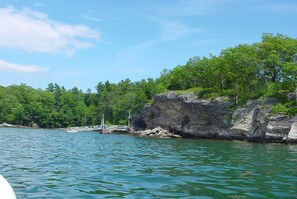 Swim from the dock alongside our cliff.