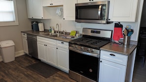 Kitchen with stainless steel appliances.