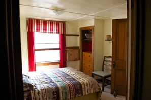 Lake House downstairs bedroom with full sized bed.