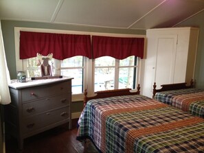 Lake House upstairs bedroom with two twin beds.