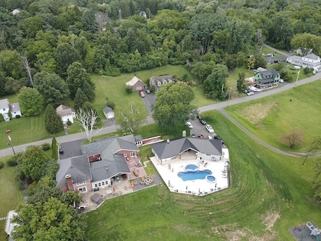 Home on the left. Pool and pavilion on the right.