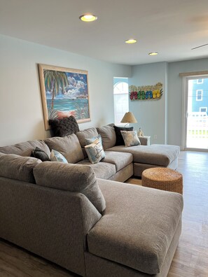 Living room area with sliding glass doors.