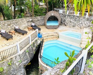 private pool and cenote with waterfall