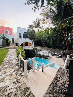 private pool and cenote with waterfall