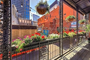 Huge balcony overlooking Printers Alley for guests of the Grand Loft