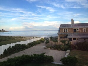 View from Master Bedroom and path to Jenness Beach. Isle of Shoals in distance.