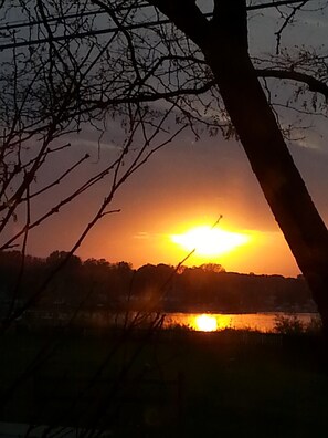 Sunset over the lake taken from inside the living room.