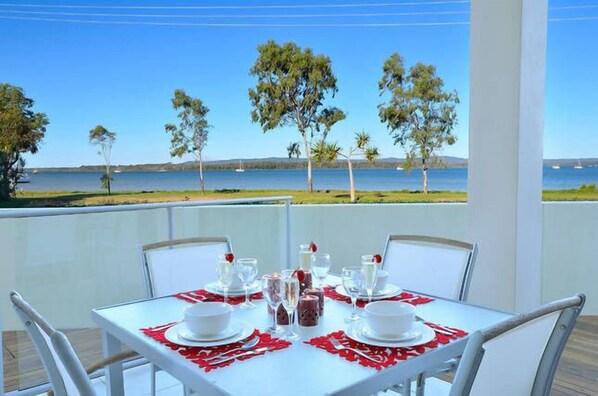 Dinner with water views and bubbles. 