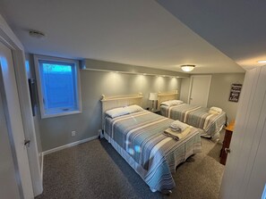 Garden level bedroom with 2 queen beds