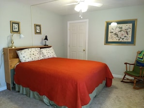 Master bed room with adjacent full bath on main floor.