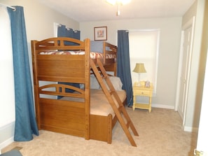 Bunk room with single upper and twin lower on main floor