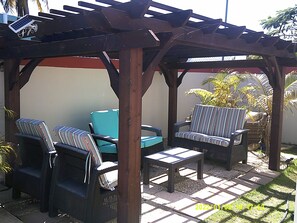 enjoy lounging by the pool in our new Gazebo