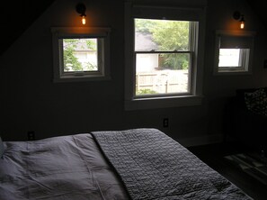 View from bed - plenty of windows (with shades for privacy).