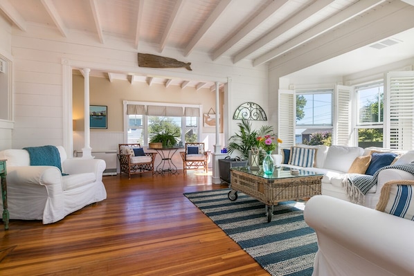 Bright, sunny and breezy, the open living room/sun room area with  ocean views!