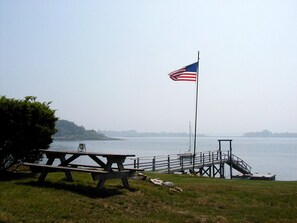 View of waterfront with picnic table