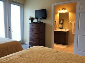 TV & DVD player in first floor bedroom. En-suite bathroom with shower background