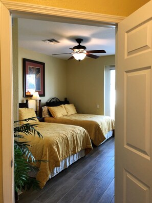 Bedroom in first floor with two full beds