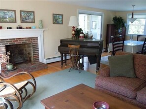 Living Rm, Dining Rm and Enclosed Sun Porch