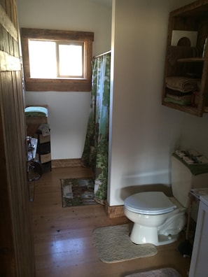 Cabin #1 bathroom with shower/tub